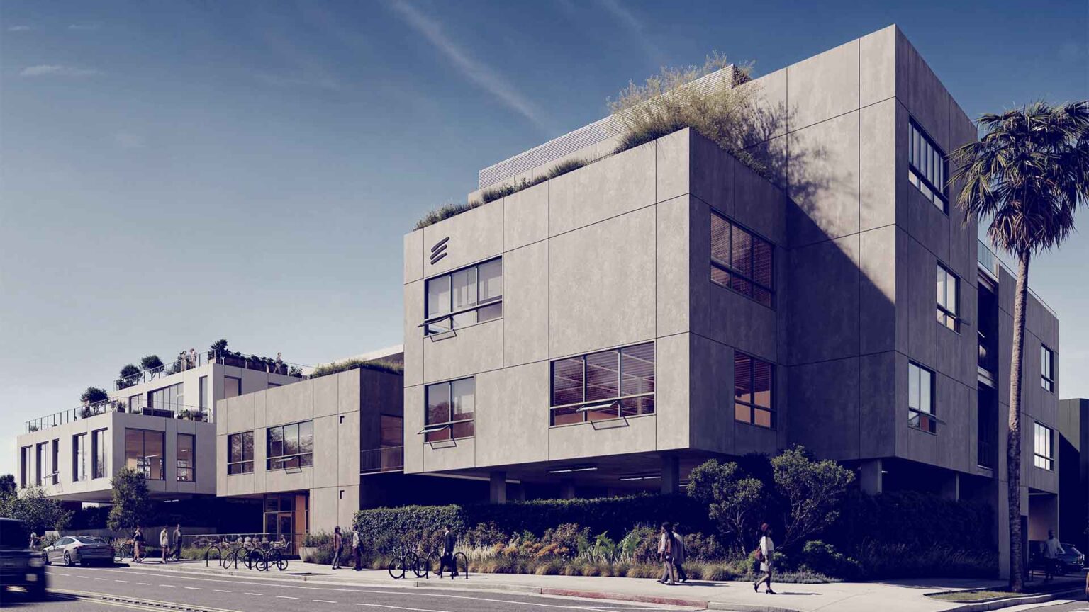 Street-facing view of Building C with layered massing and greenery.