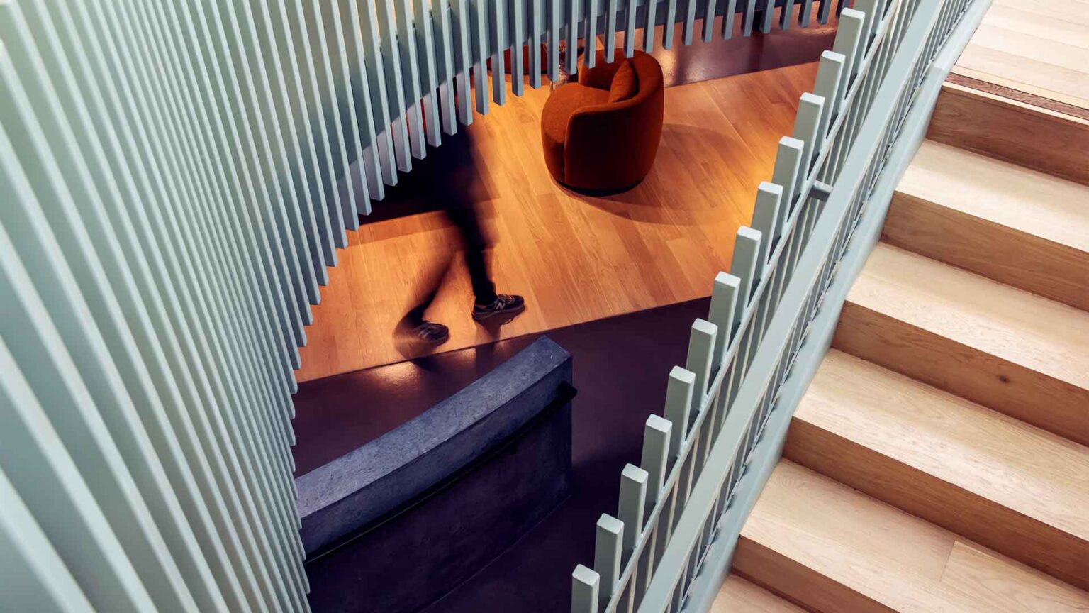 Sculptural stairwell linking work and breakout spaces.