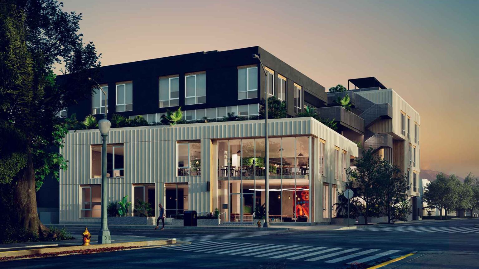 Street-level view of the creative flagship at golden hour.