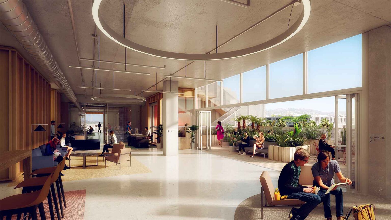 Indoor lounge opening to lush outdoor workspace.