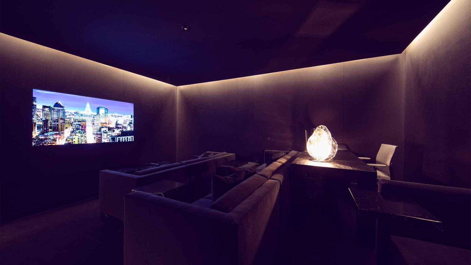 Intimate screening lounge built for presentation and review.