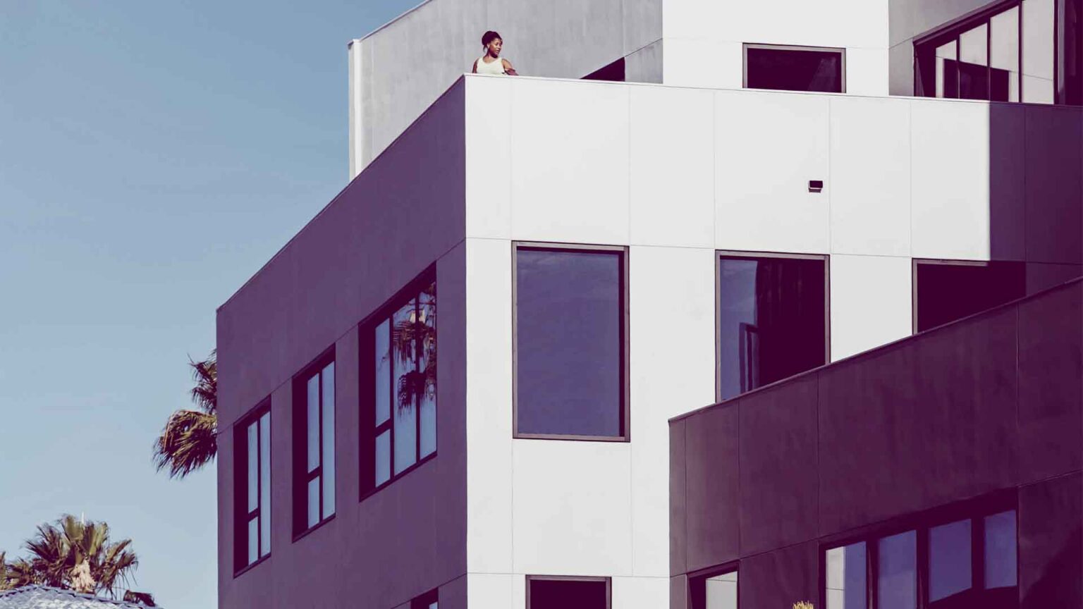 A penthouse moment - skyline backdrop and a quiet reset.