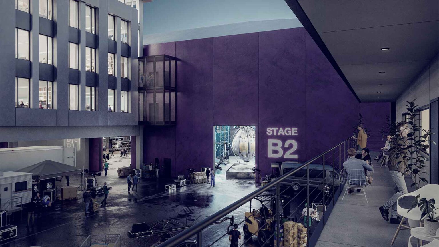 Stage B2 hums with momentum - crews above, crews below, production in motion from every angle.